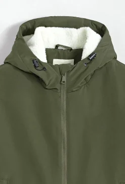 Blouson mi long à capuche moumoute