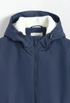 Blouson mi long à capuche moumoute