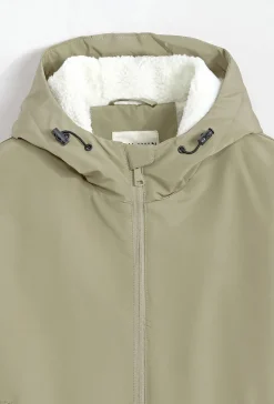 Blouson mi long à capuche moumoute