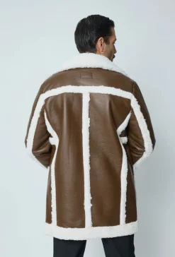 Blouson simili moumoute longue