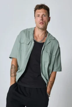 Chemise à manches courtes unie à multiples poches