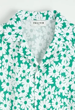 Chemise à manches courtes avec col et imprimé floral blanc sur fond camel