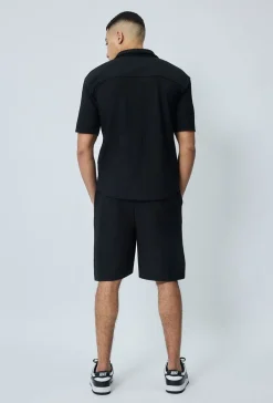 Chemise cotelée manches courtes oversize