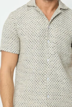 Chemise effet broderie avec des motifs carreaux