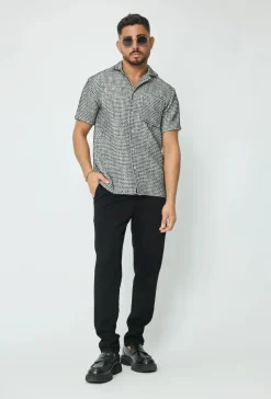 Chemise effet broderie avec des motifs carreaux
