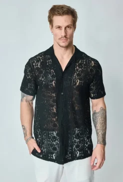 Chemise en dentelle fleurie manches courtes col à revers