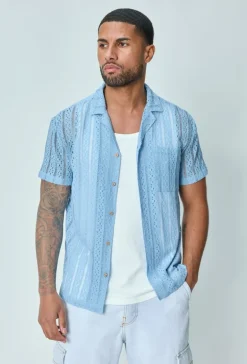 Chemise en dentelle manches courtes col à revers