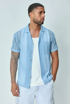Chemise en dentelle manches courtes col à revers