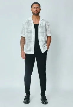 Chemise en dentelle manches courtes col à revers