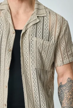 Chemise en dentelle manches courtes col à revers