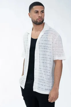Chemise en maille transparente manches courtes col à revers