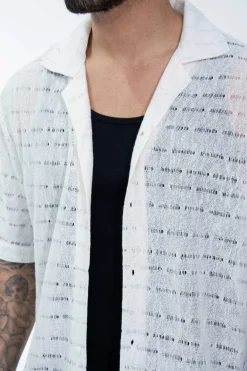Chemise en maille transparente manches courtes col à revers