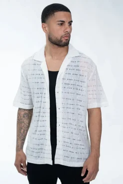 Chemise en maille transparente manches courtes col à revers