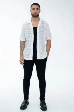 Chemise en maille transparente manches courtes col à revers