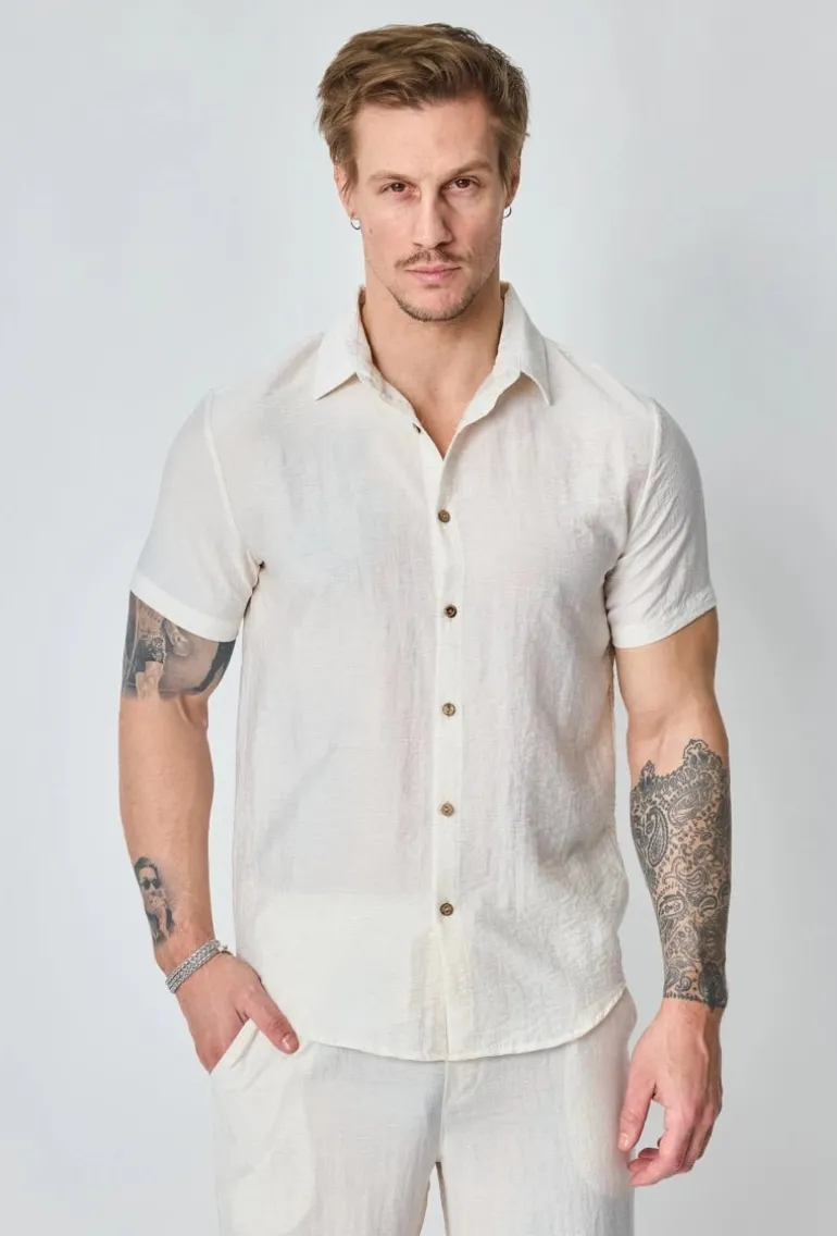 Chemise fine manches courtes unie