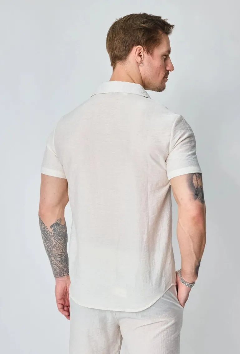 Chemise fine manches courtes unie