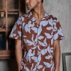 Chemise manches courtes à motifs fleuris