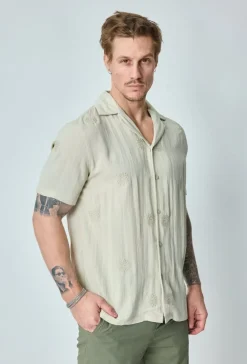 Chemise manches courtes à motifs fleuris