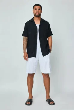 Chemise manches courtes à motifs fleuris