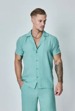 Chemise manches courtes à bouton
