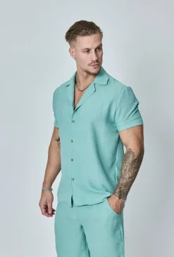 Chemise manches courtes à bouton