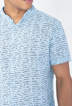 Chemise manches courtes à motifs écriture