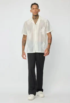 Chemise manches courtes à motifs fleuris broder