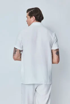 Chemise manches courtes à bouton