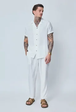 Chemise manches courtes à bouton