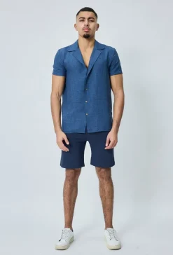 Chemise manches courtes à bouton