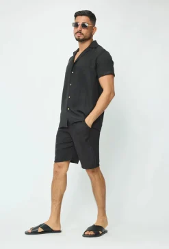 Chemise manches courtes à bouton