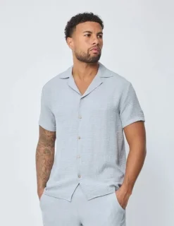 Chemise manches courtes à bouton