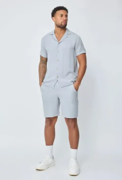 Chemise manches courtes à bouton