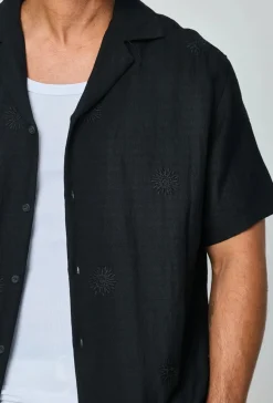 Chemise manches courtes à motifs fleuris