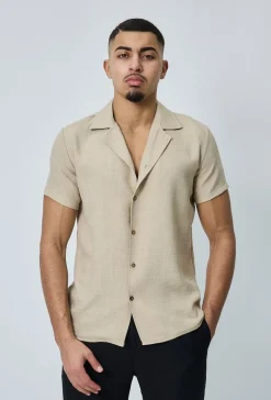 Chemise manches courtes à bouton