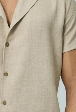 Chemise manches courtes à bouton