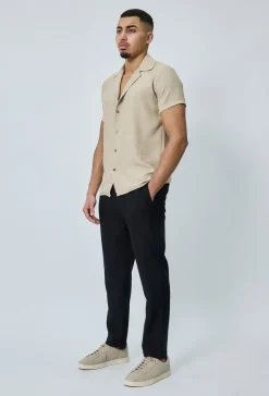 Chemise manches courtes à bouton