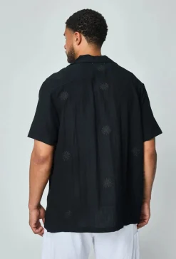 Chemise manches courtes à motifs fleuris