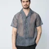 Chemise manches courtes transparente
