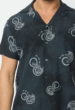 Chemise manches courtes tendance effet lin avec motif