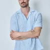 Chemise plissée manches courtes col à revers
