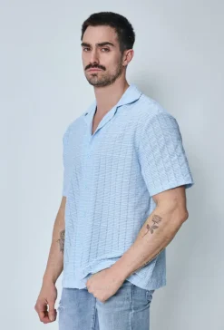 Chemise plissée manches courtes col à revers
