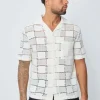 Chemise trouée manches courtes à boutons