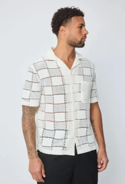 Chemise trouée manches courtes à boutons