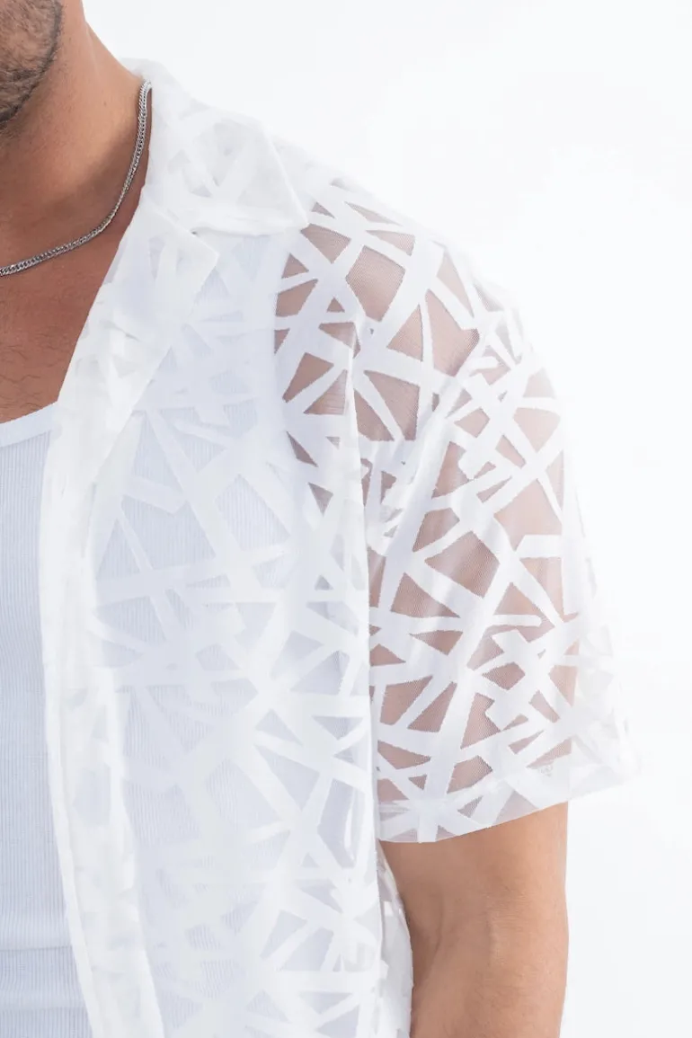 Chemise uni manches courtes transparente