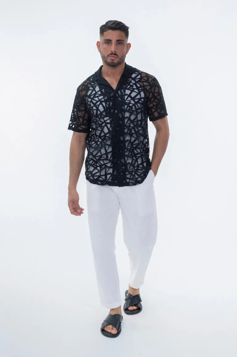 Chemise uni manches courtes transparente