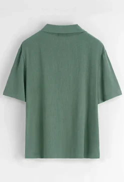 Chemise unie à boutons manches courtes