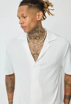 Chemise unie à motif