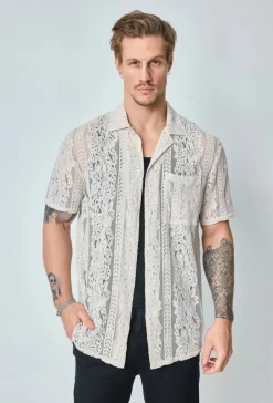 Chemise unie en dentelle manches courtes col à revers