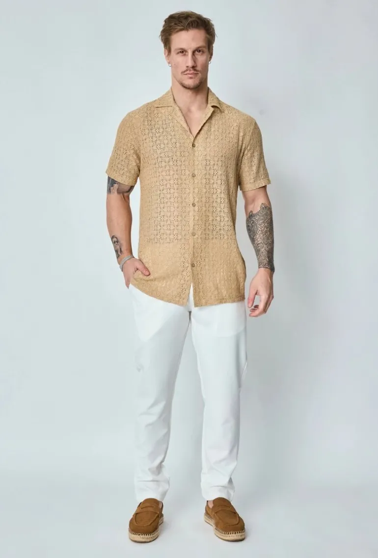 Chemise unie en dentelle manches courtes col à revers